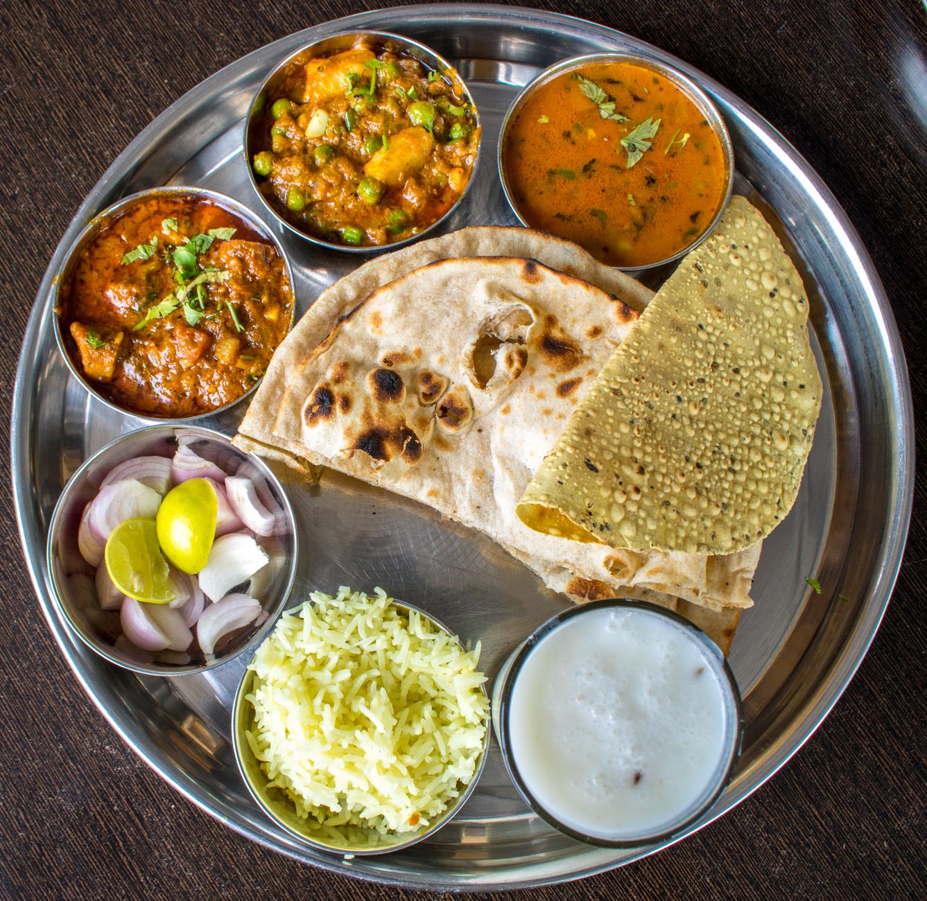 An Indian thali with dal, sabzi and other home-style dishes