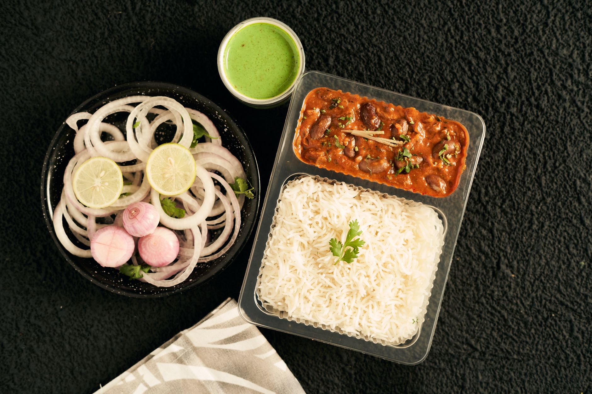 Rajma curry with basmati rice, onion salad and green chutney